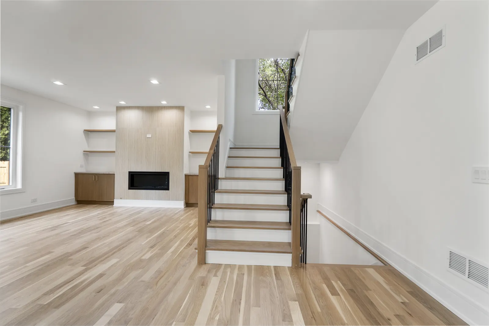 264 Churchill St. — Fireplace and stair