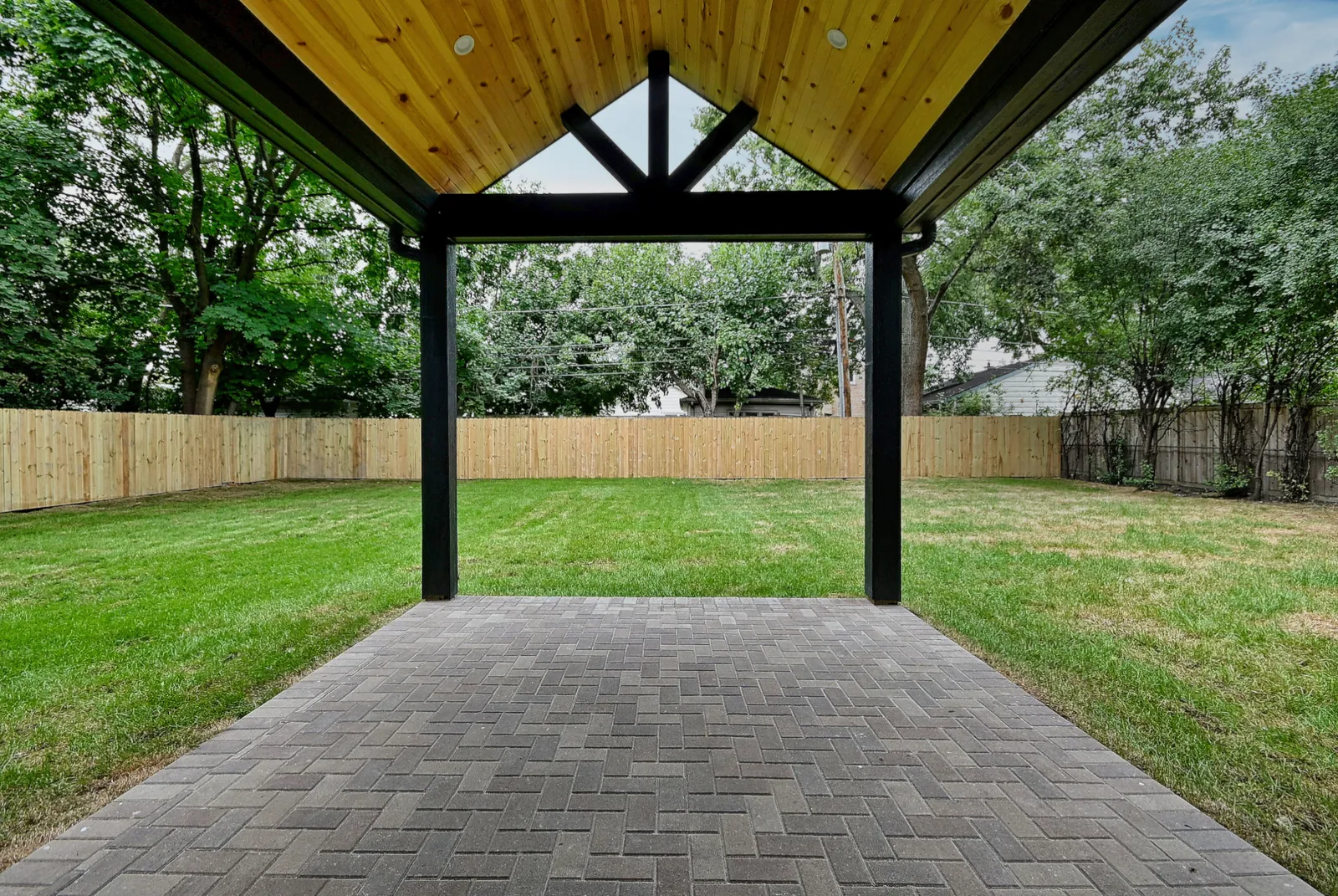 Covered patio and fenced yard